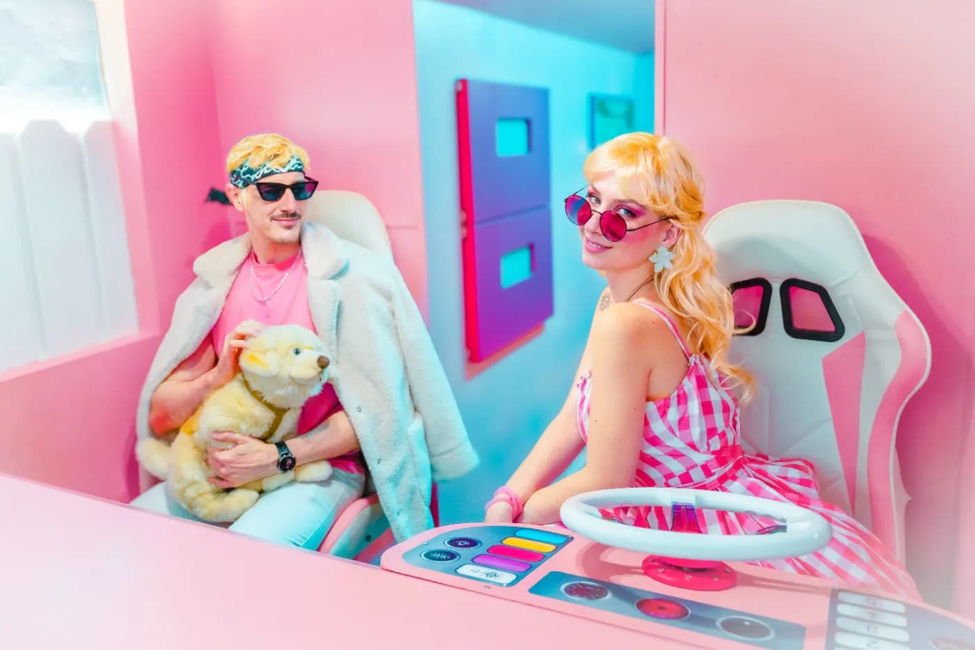 Two players in the pink set of Dream House